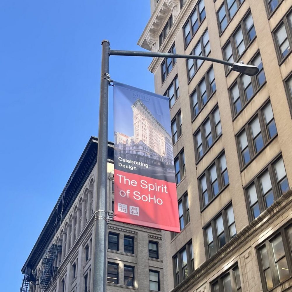 Banner Celebrating Design with Building