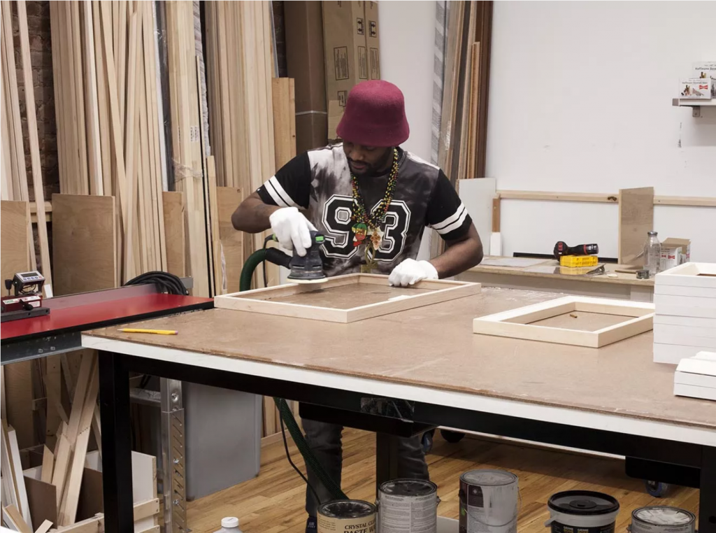 Custom framing inside Tribeca Printworks' wood shop